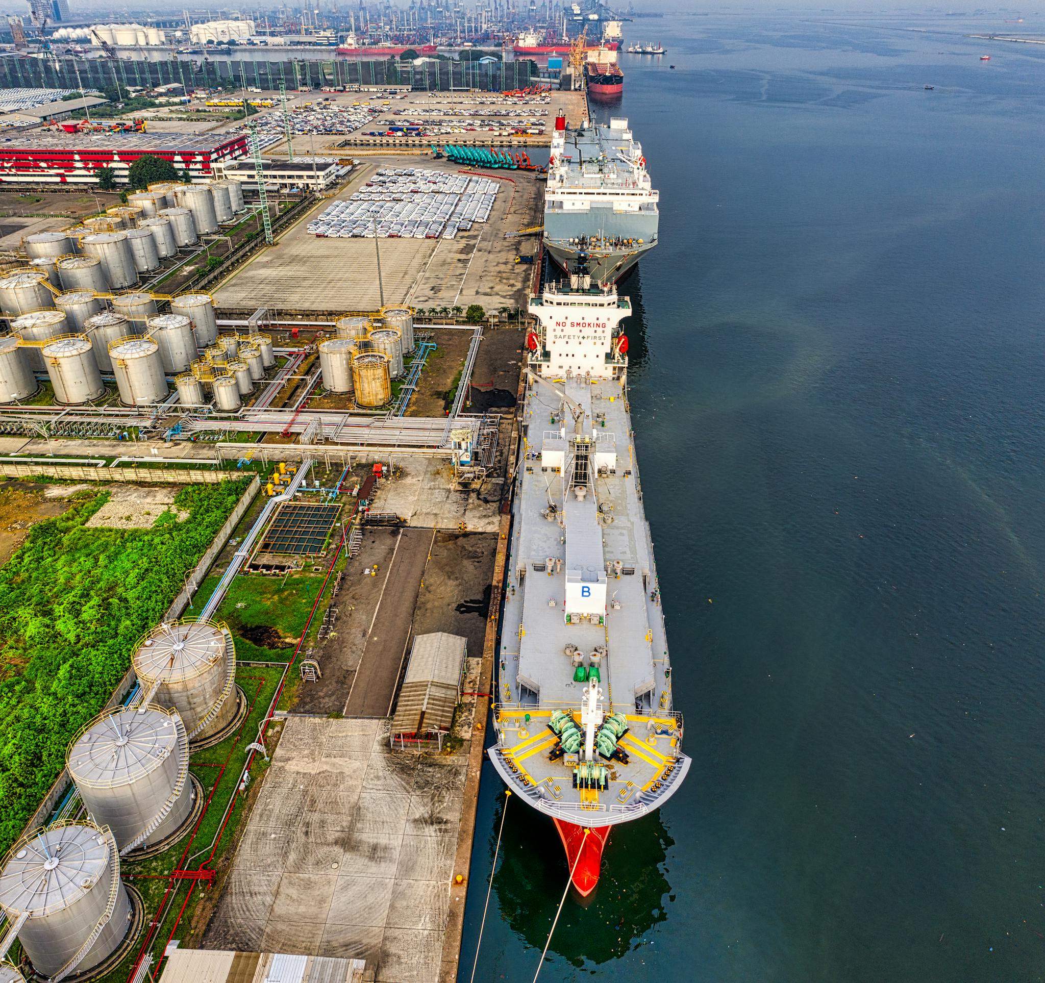 Photo by Tom Fisk Drone Shot of a Docked Oil Tanker